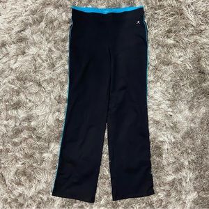 Danskin women black and blue piping wide leg yoga pants. Size M(8-10). Used.